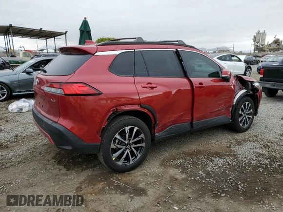 2023 Toyota Corolla Cross XLE с VIN 7MUDAAAGXPV069730, выставлен на аукционе Copart как лот 55795035 с пробегом 26 368 миль миль и Списание • Salvage title. История ставок и продаж доступна на DreamBid. Изображение 3.