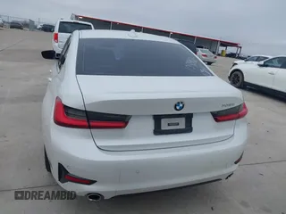 2021 BMW 3 Series 330i z VIN 3MW5R1J08M8B58921, wystawiony jako IAAI lot #41495865 z przebiegiem 82 971 mil mil oraz . Historia ofert i sprzedaży dostępna na DreamBid. Obrazek 16.