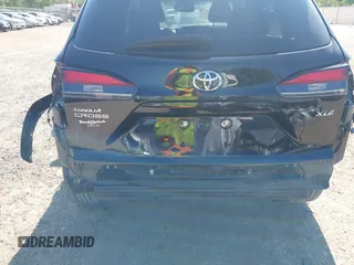2024 Toyota Corolla Cross XLE z VIN 7MUDAAAG0RV080383, wystawiony jako IAAI lot #42032391 z przebiegiem 16 593 mil mil oraz . Historia ofert i sprzedaży dostępna na DreamBid. Obrazek 21.