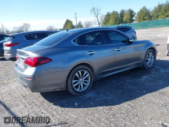 2018 Infiniti Q70 Luxe with VIN JN1BY1AR3JM220783, listed as a IAAI auction lot 41480241 with 95,739 mi miles and . Bid and sale history available at DreamBid. Image 4.