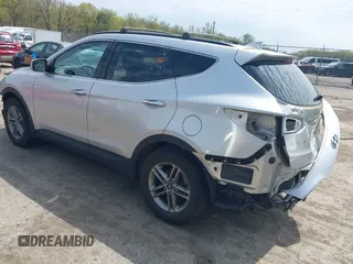 2017 Hyundai Santa Fe 2.4L z VIN 5XYZUDLB6HG400828, wystawiony jako IAAI lot #42013903 z przebiegiem 88 573 mil mil oraz . Historia ofert i sprzedaży dostępna na DreamBid. Obrazek 3.