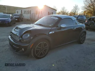 2013 MINI Coupe S with VIN WMWSX3C53DT466665, listed as a Copart auction lot 79497824 with 94,767 mi miles and Salvage Title. Bid and sale history available at DreamBid. Image 1.