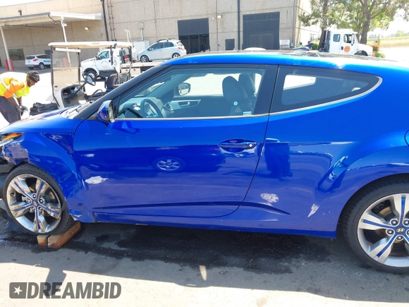 2013 Hyundai Veloster w/Black Int with VIN KMHTC6AD6DU143974, listed as a IAAI auction lot 42164745 with 136,195 mi miles and . Bid and sale history available at DreamBid. Image 14.