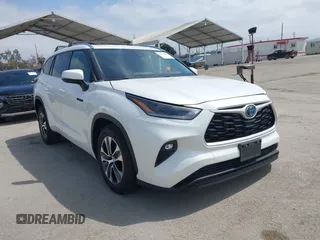 2021 Toyota Highlander Hybrid XLE z VIN 5TDHARAH4MS507897, wystawiony jako IAAI lot #42238462 z przebiegiem 49 231 mil mil oraz . Historia ofert i sprzedaży dostępna na DreamBid. Obrazek 1.