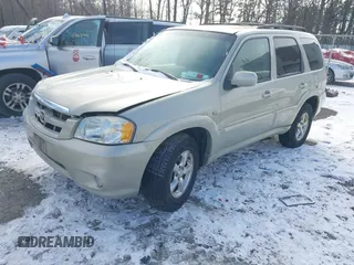 2006 Mazda Tribute LX with VIN 4F2YZ94126KM09467, listed as a IAAI auction lot 41324941 with 116,519 mi miles and . Bid and sale history available at DreamBid. Image 2.