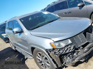 2014 Jeep Grand Cherokee Overland with VIN 1C4RJFCM4EC316142, listed as a IAAI auction lot 40607061 with 195,008 mi miles. Bid and sale history available at carsss.com. Image 1.