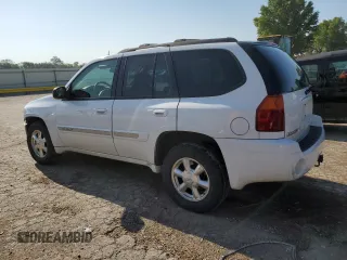 2005 GMC Envoy SLT with VIN 1GKDT13S852185958, listed as a Copart auction lot 68736194 with 225,398 mi miles and Salvage Title. Bid and sale history available at DreamBid. Image 2.