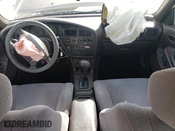 1994 Toyota Camry LE z VIN JT2GK12E2R0050878, wystawiony jako Copart lot #46878005 z przebiegiem 152 211 mil mil oraz Szkoda całkowita • Salvage title. Historia ofert i sprzedaży dostępna na DreamBid. Obrazek 8.