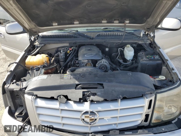 2004 Cadillac Escalade z VIN 1GYEC63T44R235759, wystawiony jako Copart lot #53166755 z przebiegiem 212 034 mil mil oraz Szkody całkowita. Historia ofert i sprzedaży dostępna na DreamBid. Obrazek 12.
