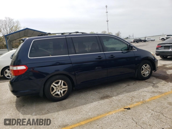2007 Honda Odyssey EX with VIN 5FNRL38477B101619, listed as a Copart auction lot 54134505 with 129,468 mi miles and Clean title. Bid and sale history available at DreamBid. Image 3.