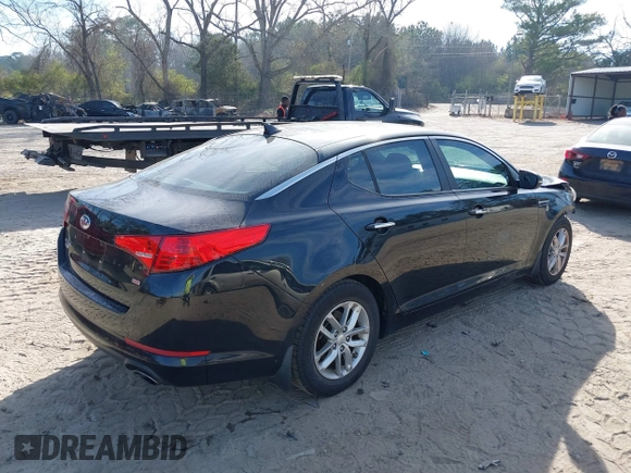 2013 Kia Optima LX with VIN 5XXGM4A74DG101584, listed as a IAAI auction lot 41835179 with 123,689 mi miles. Bid and sale history available at carsss.com. Image 4.
