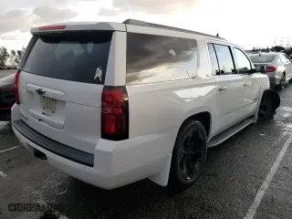 2015 Chevrolet Suburban LS with VIN 1GNSCHKC9FR667540, listed as a Copart auction lot 80908574 with 125,428 mi miles and Salvage Title. Bid and sale history available at carsss.com. Image 3.