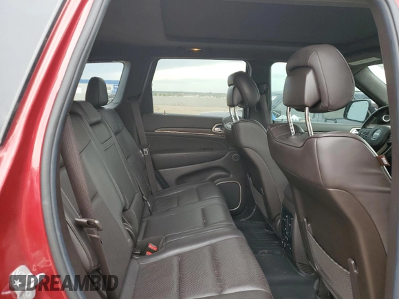 2014 Jeep Grand Cherokee Summit z VIN 1C4RJFJT8EC359165, wystawiony jako Copart lot #57037225 z przebiegiem 163 372 mil mil oraz Szkoda całkowita • Salvage title. Historia ofert i sprzedaży dostępna na DreamBid. Obrazek 11.