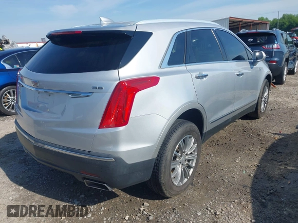 2017 Cadillac XT5 Luxury FWD z VIN 1GYKNBRS3HZ223077, wystawiony jako IAAI lot #42091584 z przebiegiem 154 664 mil mil oraz . Historia ofert i sprzedaży dostępna na DreamBid. Obrazek 4.