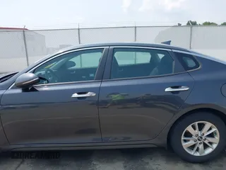 2016 Kia Optima LX with VIN KNAGT4L33G5111199, listed as a IAAI auction lot 42380970 with 97,072 mi miles and . Bid and sale history available at DreamBid. Image 14.