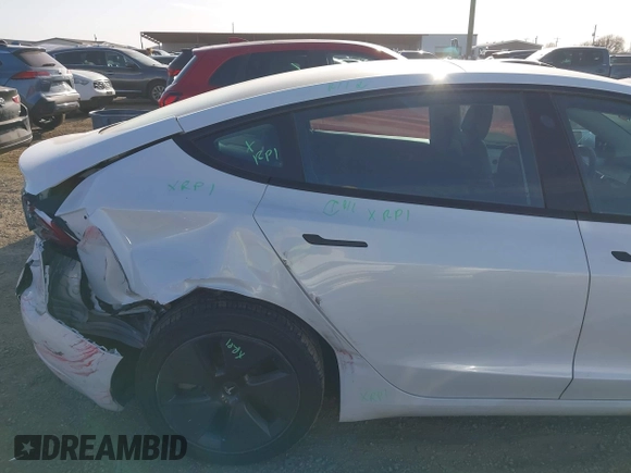 2023 Tesla Model 3 with VIN 5YJ3E1EAXPF436212, listed as a IAAI auction lot 41727400 with 81,011 mi miles and . Bid and sale history available at carsss.com. Image 19.