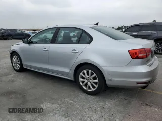 2015 Volkswagen Jetta SE with VIN 3VWD17AJ5FM285618, listed as a Copart auction lot 59930985 with 146,382 mi miles and Salvage title. Bid and sale history available at DreamBid. Image 2.
