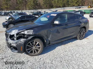 2019 BMW X4 M40i with VIN 5UXUJ5C53KLJ63471, listed as a Copart auction lot 83407004 with 89,520 mi miles and Salvage Title. Bid and sale history available at carsss.com. Image 1.