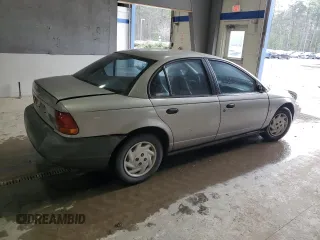 1998 Saturn SL with VIN 1G8ZF5285WZ204569, listed as a Copart auction lot 43624765 with 318,544 mi miles and Salvage Title. Bid and sale history available at carsss.com. Image 3.