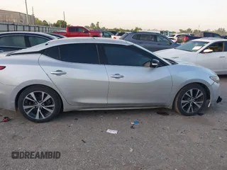 2016 Nissan Maxima SR z VIN 1N4AA6AP9GC382348, wystawiony jako IAAI lot #42012121 z przebiegiem 203 513 mil mil oraz . Historia ofert i sprzedaży dostępna na DreamBid. Obrazek 12.