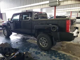 2009 Hummer H3 with VIN 5GNEN13EX98140981, listed as a Copart auction lot 87460374 with 111,362 mi miles and Salvage Title. Bid and sale history available at DreamBid. Image 2.