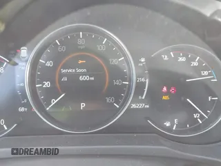 2023 Mazda CX-5 S Premium with VIN JM3KFBDM7P0201038, listed as a IAAI auction lot 41772989 with 26,227 mi miles and . Bid and sale history available at DreamBid. Image 7.