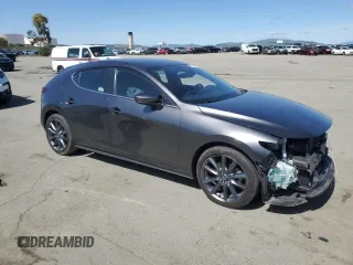 2019 Mazda 3 Preferred with VIN JM1BPBMM2K1133482, listed as a Copart auction lot 50001155 with 71,132 mi miles and Salvage title. Bid and sale history available at DreamBid. Image 4.