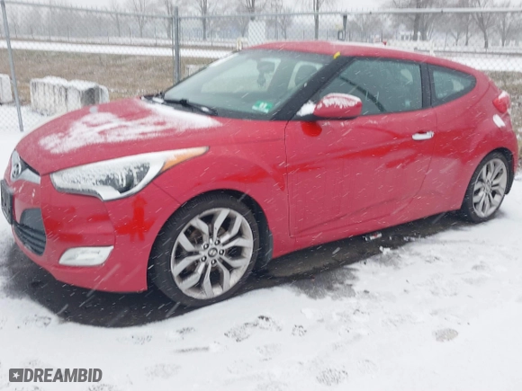 2014 Hyundai Veloster with VIN KMHTC6AD8EU214612, listed as a IAAI auction lot 41258820 with 61,984 mi miles. Bid and sale history available at carsss.com. Image 17.