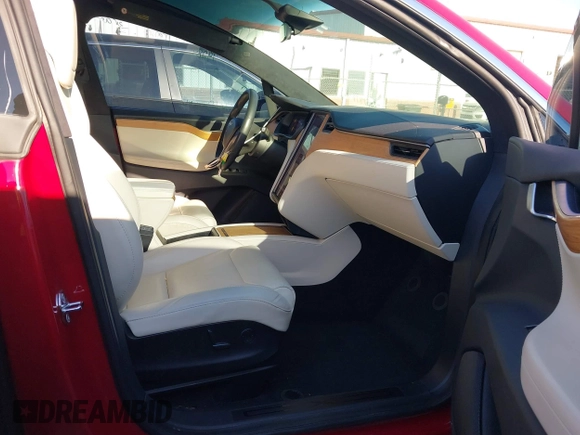2020 Tesla Model X Long Range with VIN 5YJXCDE22LF217014, listed as a IAAI auction lot 41845824 with 149,375 mi miles and . Bid and sale history available at DreamBid. Image 5.
