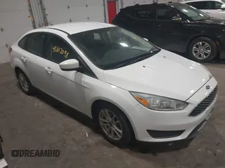 2018 Ford Focus SE with VIN 1FADP3F29JL312721, listed as a IAAI auction lot 41012098 with 126,214 mi miles. Bid and sale history available at carsss.com. Image 1.