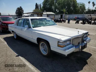1990 Cadillac Brougham z VIN 1G6DW5479LR709291, wystawiony jako Copart lot #50173935 z przebiegiem 53 477 mil mil oraz Tytuł czysty. Historia ofert i sprzedaży dostępna na DreamBid. Obrazek 4.