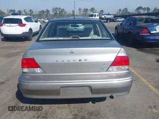 2003 Mitsubishi Lancer ES with VIN JA3AJ26E63U007501, listed as a IAAI auction lot 41771016 with 146,984 mi miles. Bid and sale history available at carsss.com. Image 16.