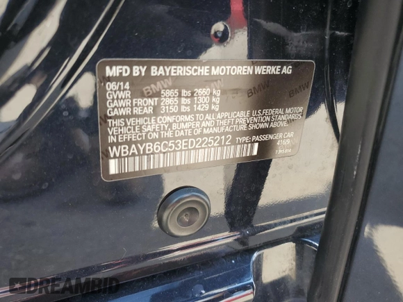 2014 BMW 7 Series 750i xDrive with VIN WBAYB6C53ED225212, listed as a Copart auction lot 71866424 with 122,567 mi miles and Salvage Title. Bid and sale history available at carsss.com. Image 12.