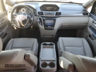 2014 Honda Odyssey EX-L with VIN 5FNRL5H61EB005740, listed as a Copart auction lot 54663595 with 118,971 mi miles and Salvage Title. Bid and sale history available at DreamBid. Image 8.