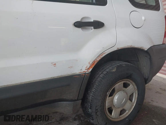 2004 Ford Escape XLS with VIN 1FMYU02134DA08567, listed as a IAAI auction lot 41872076 with 239,602 mi miles and . Bid and sale history available at DreamBid. Image 6.