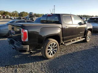 2021 GMC Canyon 2WD Denali with VIN 1GTG5EEN2M1107052, listed as a Copart auction lot 76377704 with 11,696 mi miles and Salvage Title. Bid and sale history available at carsss.com. Image 3.