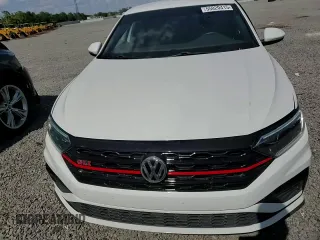 2021 Volkswagen Jetta GLI S с VIN 3VW6T7BU7MM021776, выставлен на аукционе Copart как лот 55020415 с пробегом 61 456 миль миль и На запчасти • Non repairable. История ставок и продаж доступна на DreamBid. Изображение 13.