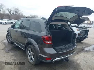2017 Dodge Journey Crossroad Plus z VIN 3C4PDCGG6HT544668, wystawiony jako IAAI lot #40387483 z przebiegiem 61 712 mil mil oraz . Historia ofert i sprzedaży dostępna na DreamBid. Obrazek 3.
