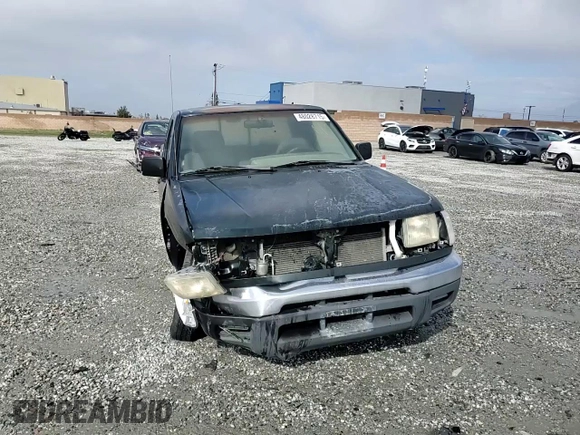 1999 Nissan Frontier XE with VIN 1N6DD26S6XC332458, listed as a Copart auction lot 48028715 with 182,706 mi miles and Salvage title. Bid and sale history available at DreamBid. Image 11.