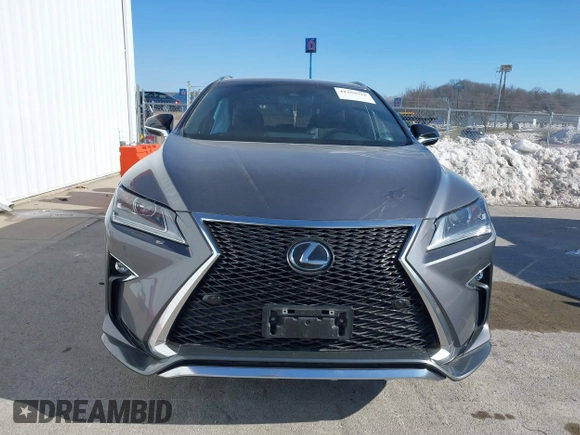 2018 Lexus RX 350 with VIN 2T2BZMCA8JC135823, listed as a IAAI auction lot 41359316 with 103,756 mi miles and . Bid and sale history available at DreamBid. Image 12.