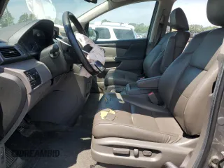 2014 Honda Odyssey Touring with VIN 5FNRL5H93EB061754, listed as a Copart auction lot 55182015 with 168,058 mi miles and Salvage title. Bid and sale history available at DreamBid. Image 7.