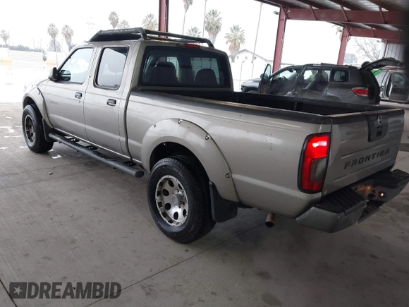 2003 Nissan Frontier SE z VIN 1N6ED29X73C438326, wystawiony jako IAAI lot #41437797 z przebiegiem 309 235 mil mil oraz . Historia ofert i sprzedaży dostępna na DreamBid. Obrazek 3.