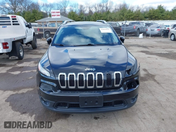 2014 Jeep Cherokee Latitude with VIN 1C4PJMCS6EW219999, listed as a IAAI auction lot 42044695 with 169,533 mi miles and . Bid and sale history available at carsss.com. Image 13.