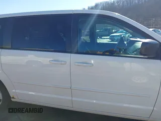2013 Dodge Grand Caravan SE with VIN 2C4RDGBG0DR760598, listed as a IAAI auction lot 41590428 with 182,847 mi miles and . Bid and sale history available at DreamBid. Image 13.
