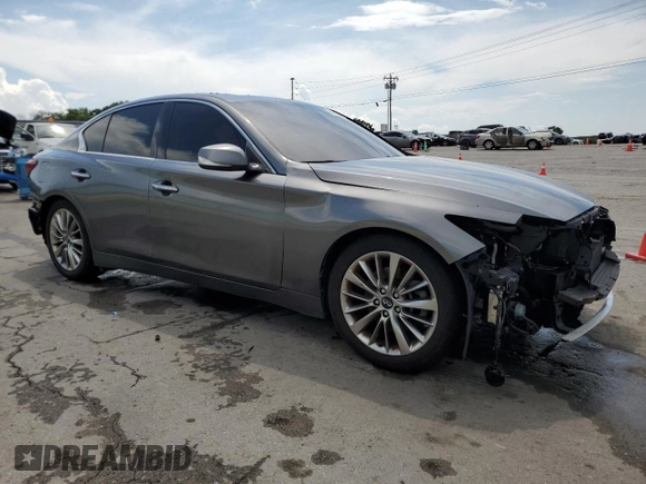 2018 Infiniti Q50 Luxe with VIN JN1EV7AP1JM353730, listed as a Copart auction lot 65150885 with 59,821 mi miles and Salvage title. Bid and sale history available at DreamBid. Image 4.