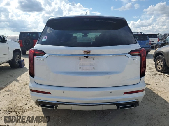 2022 Cadillac XT6 Premium Luxury with VIN 1GYKPCRS0NZ182810, listed as a Copart auction lot 74277474 with 0 mi miles and Salvage Title. Bid and sale history available at carsss.com. Image 6.