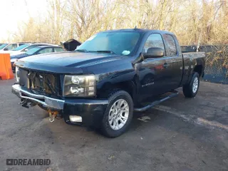 2011 Chevrolet Silverado 1500 LT with VIN 1GCRCSE06BZ300806, listed as a IAAI auction lot 41717597 with 153,697 mi miles. Bid and sale history available at carsss.com. Image 2.