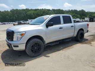 2021 Nissan Titan SV with VIN 1N6AA1EC1MN500684, listed as a Copart auction lot 57528415 with 73,598 mi miles and Salvage title. Bid and sale history available at DreamBid. Image 1.