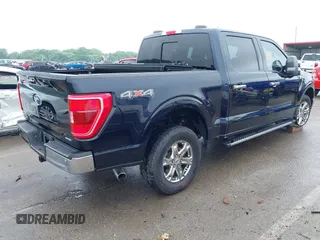 2021 Ford F-150 XL with VIN 1FTEW1EP7MKE40582, listed as a IAAI auction lot 42415827 with 66,579 mi miles and . Bid and sale history available at DreamBid. Image 4.