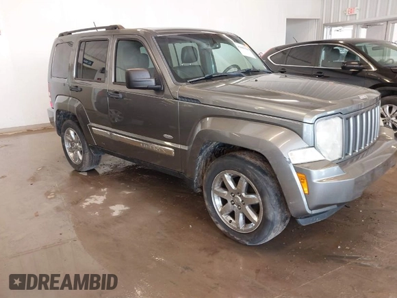 2012 Jeep Liberty Sport with VIN 1C4PJMAK9CW176792, listed as a IAAI auction lot 41685594 with 213,748 mi miles. Bid and sale history available at carsss.com. Image 1.